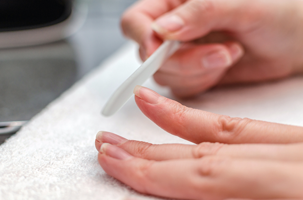 In 5 Steps to Beautiful & Well-Groomed Nails 2 Round off the edges with a file