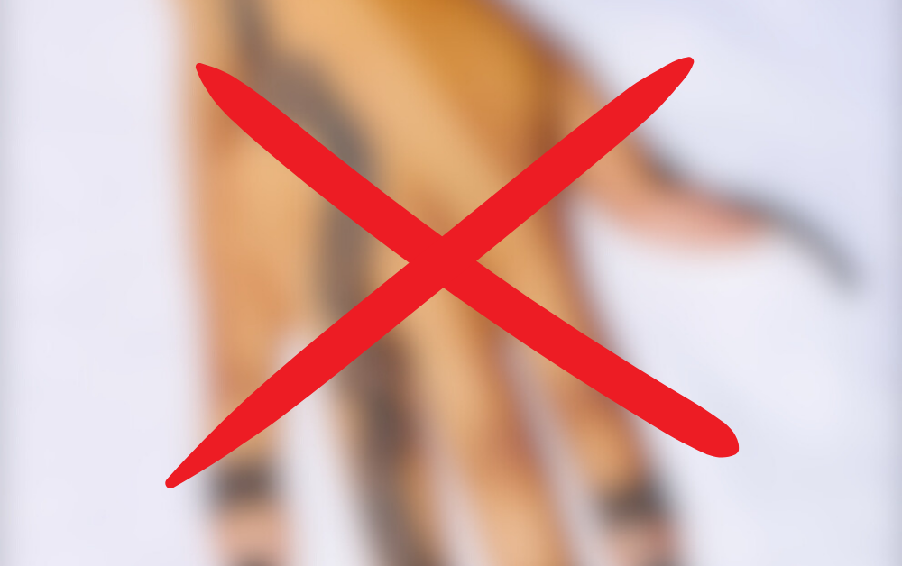 A blurred image of hand adornment with a red X, symbolizing the choice of authentic tradition (like henna) over superficial imitations.