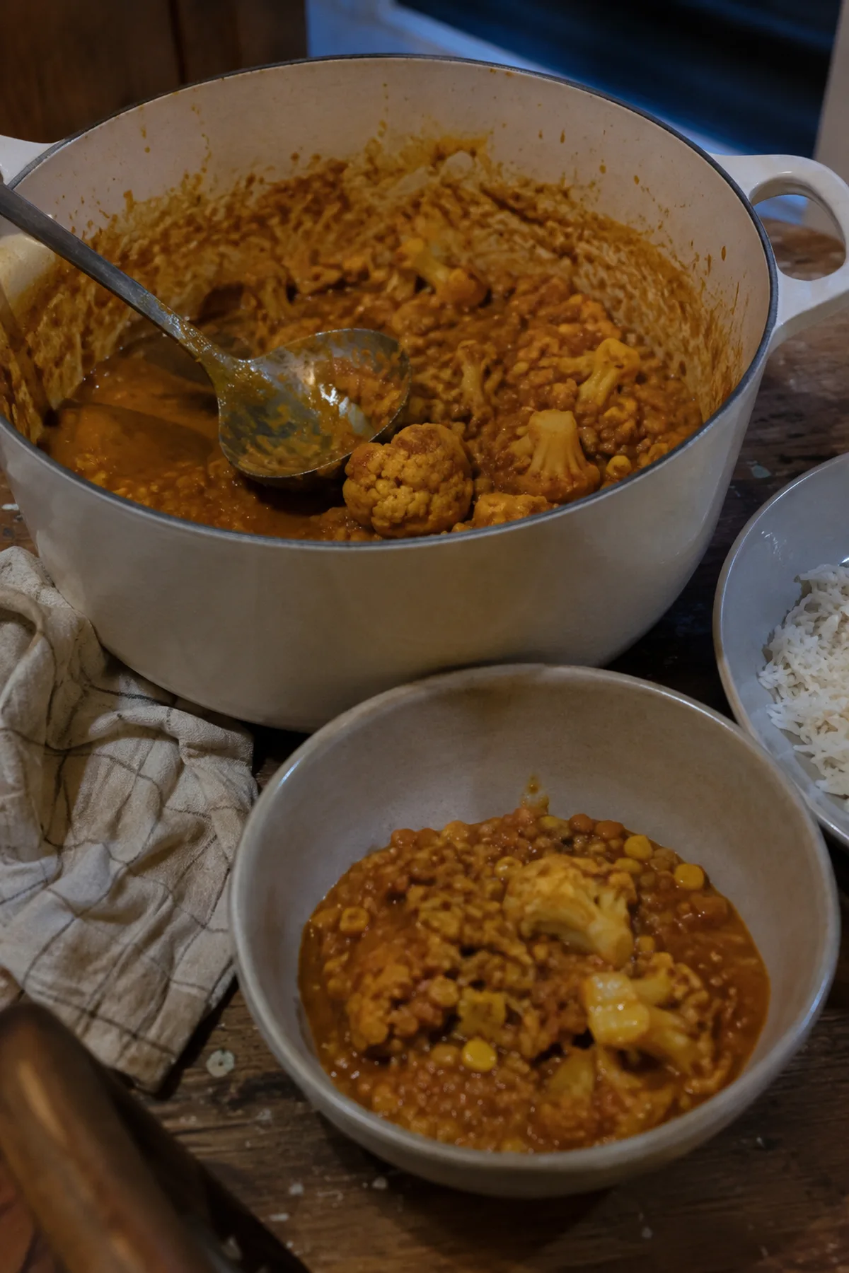 30-Minute Dinners That Bridge the Gap Between Summer and Fall 7 Coconut red lentil curry with corn and cauliflower beside a serving bowl